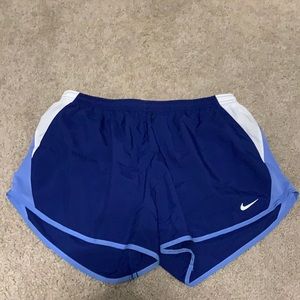 Nike Dri-Fit running shorts. Size large, blue